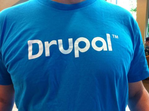 drupal written on the front of a blue tshirt